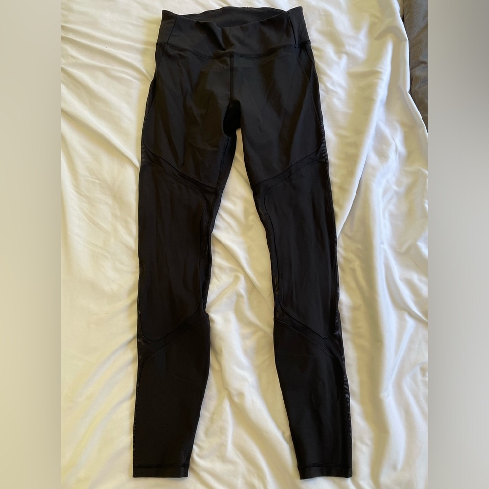 Lululemon size 6 black legging with mesh detailing
